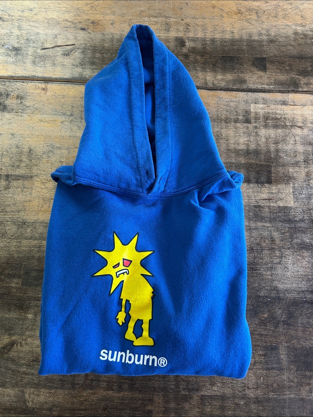 Dominic Fike Merch Blue Hoodie with Yellow Sunburn Graphic